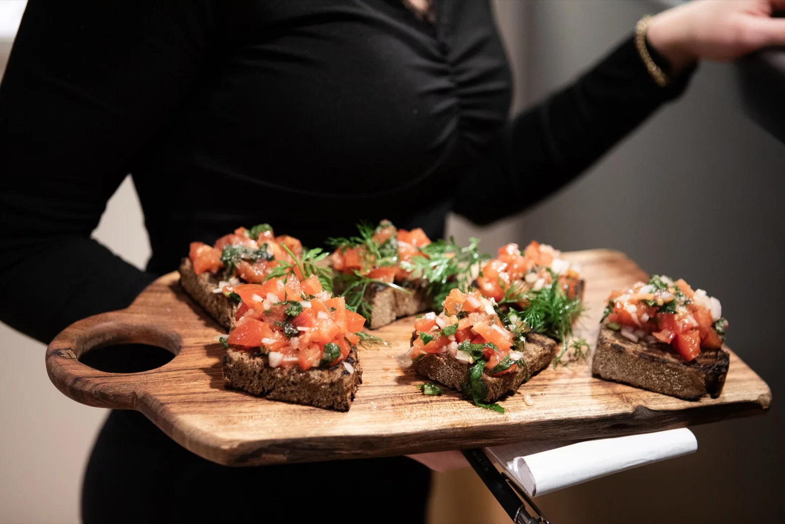 A board of bruschetta being served at Il Padrino