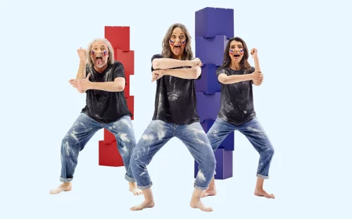 Three women dancing in front of red and blue blocks, from the CalxPlus campaign