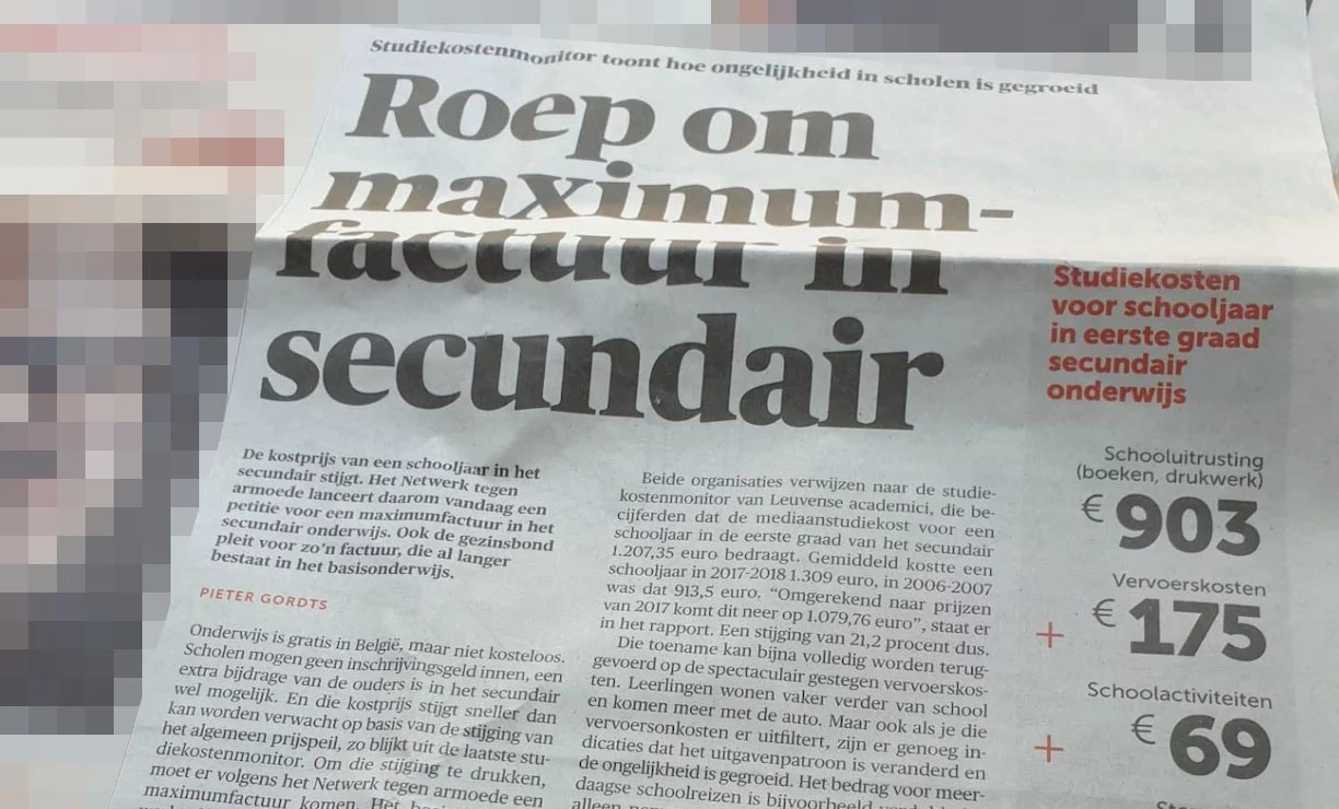Photo of a newspaper page with the headline &ldquo;Roep om maximumfactuur in secundair&rdquo; and a box listing school costs