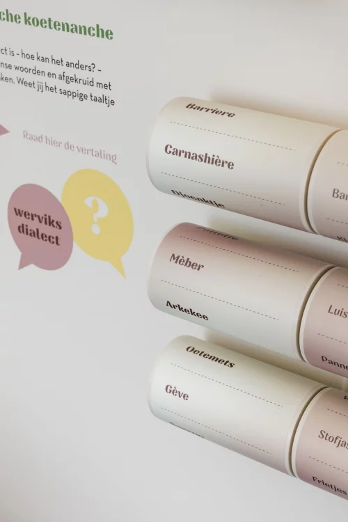 A row of information panels on stands in the tourist welcome centre in Wervik, in front of a window reading From Viroviacum to Wervik