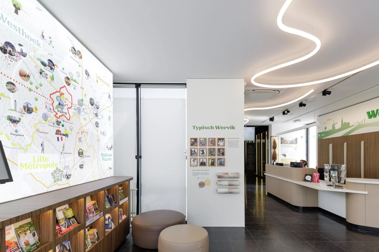 The tourist welcome centre in Wervik with a large map of the Westhoek region, leaflet racks and the desk